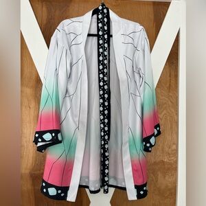Adult demon slayer costume Robe worn once. A few stains shown in pictures. small